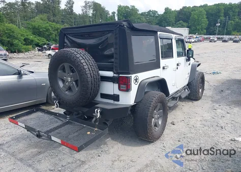 2015 Jeep Wrangler Unlimited Freedom Edition from USA, damaged, VIN 1C4BJWDG0FL568501